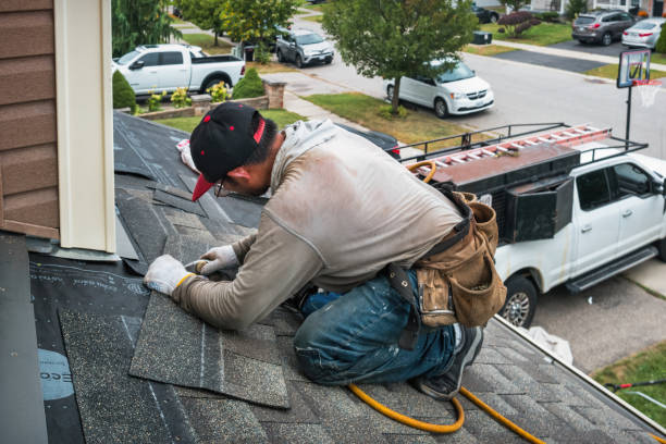Professional Roofing technician working in Rome, NY